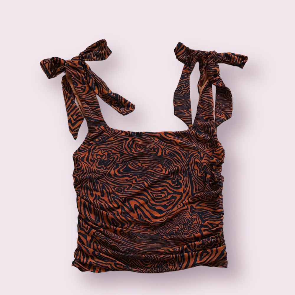 NWOT Avenue printed tank top by Free People in size Large